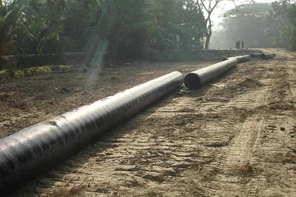 Coated pipeline strung along the right of way